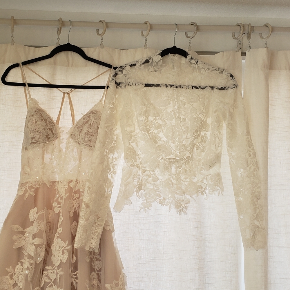 Brand new wedding dress. Never worn or altered.